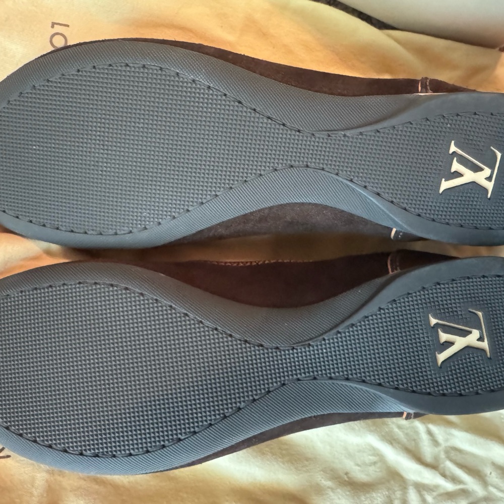New, Never worn Louis Vuitton women’s tennis shoes. Size 8